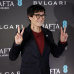 
              Ke Huy Quan poses for photographers upon arrival for the BAFTA Nominees Party in London, Saturday, Feb. 18, 2023 (Photo by Vianney Le Caer/Invision/AP)
            