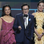 
              Stephanie Hsu, from left, Ke Huy Quan, and Michelle Yeo, members of the cast of "Everything Everywhere All At Once," introduce a clip from their film at the 29th annual Screen Actors Guild Awards on Sunday, Feb. 26, 2023, at the Fairmont Century Plaza in Los Angeles. (AP Photo/Chris Pizzello)
            