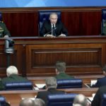 
              Russian President Vladimir Putin, center, speaks as Russian Defense Minister Sergei Shoigu, left, and Chief of the General Staff Gen. Valery Gerasimov attend a meeting with senior military officers in Moscow, Russia, Wednesday, Dec. 21, 2022. (Sergey Fadeichev, Sputnik, Kremlin Pool Photo via AP, File)
            