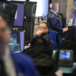 
              Traders work on the floor at the New York Stock Exchange in New York, Wednesday, Feb. 22, 2023. (AP Photo/Seth Wenig)
            