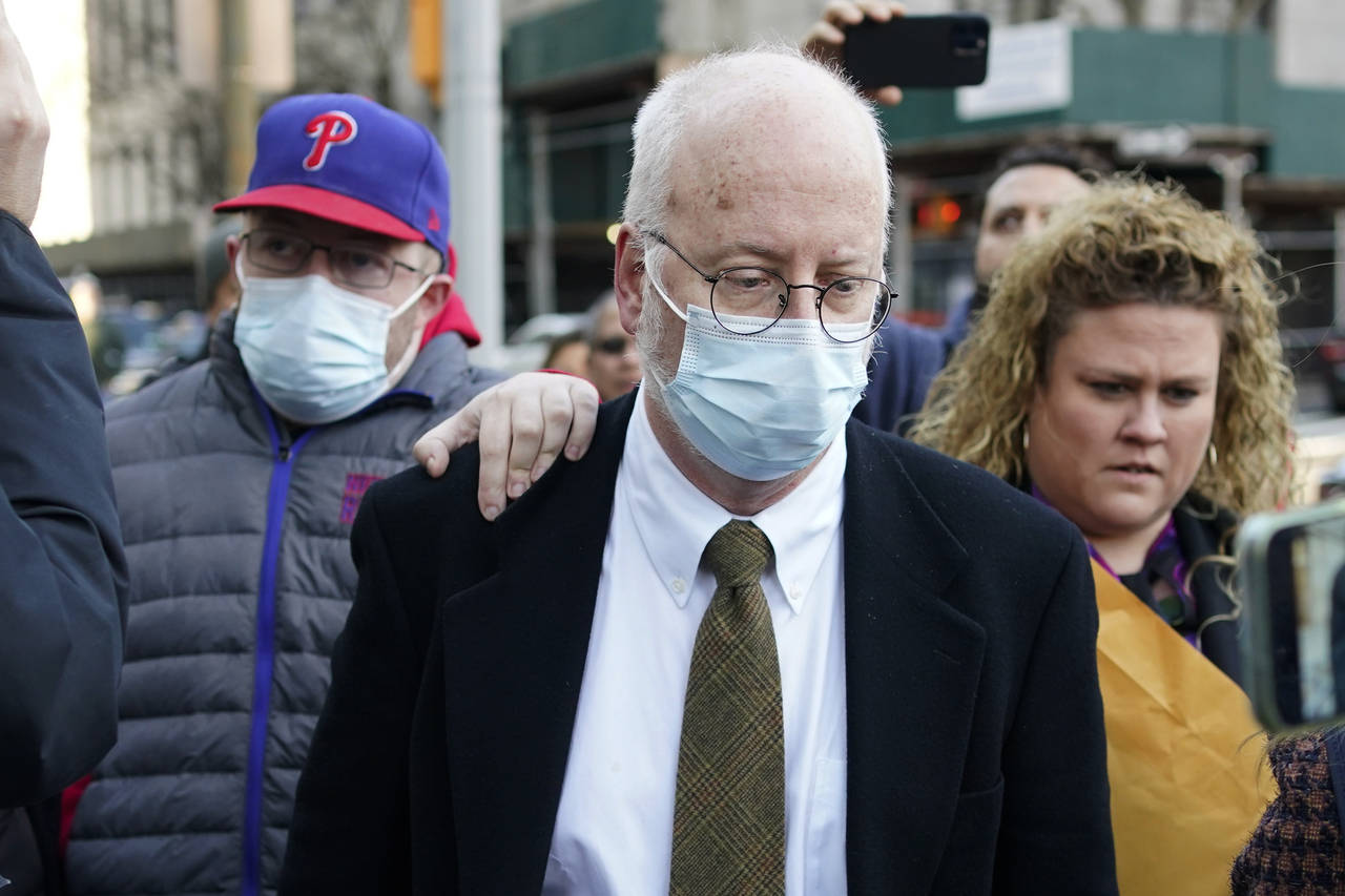FILE - Robert Hadden, center, leaves the federal courthouse in New York, Tuesday, Jan. 24, 2023. A ...