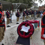 
              A police contingent salutes during a funeral for a police officer, a victim of Monday's suicide bombing, in Peshawar, Pakistan, Feb. 2, 2023. A suicide bomber who killed 101 people at a mosque in northwest Pakistan this week had disguised himself in a police uniform and did not raise suspicion among guards, the provincial police chief said on Thursday. (AP Photo/Muhammad Sajjad)
            