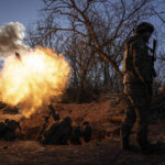 
              FALTA 13, 28 FILE  - Ukrainian servicemen fire a 120mm mortar towards Russian positions at the frontline near Bakhmut, Donetsk region, Ukraine, Wednesday, Jan. 11, 2023. (AP Photo/Evgeniy Maloletka, File)
            