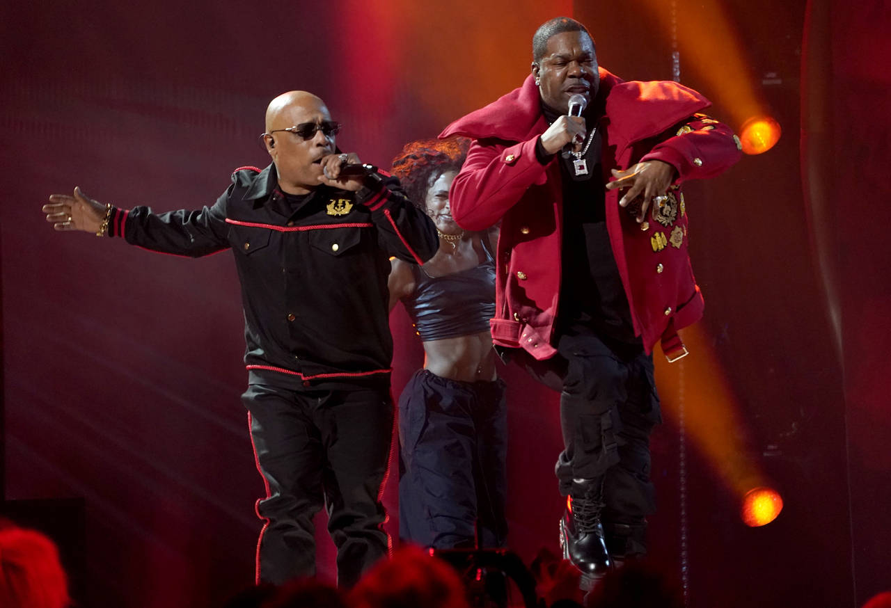 Spliff Star, left, and Busta Rhymes perform "Put Your Hands Where My Eyes Could See" at the 65th an...