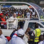 
              Pope Francis arrives at Ndolo airport to celebrate Holy Mass, in Kinshasa, Congo, Wednesday Feb. 1, 2023. Francis is in Congo and South Sudan for a six-day trip, hoping to bring comfort and encouragement to two countries that have been riven by poverty, conflicts and what he calls a "colonialist mentality" that has exploited Africa for centuries. (AP Photo/Jerome Delay)
            