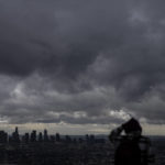 
              Storm clouds hover over Los Angeles, Thursday, Feb. 23, 2023. For the first time since 1989, the National Weather Service issued a blizzard warning for the Southern California mountains. (AP Photo/Jae C. Hong)
            