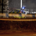 
              PSNI officers investigate at the scene of a shooting in the Killyclogher Road area of Omagh, where a man, a serving police officer, was injured in a shooting incident at a sports complex in Omagh, Northern Ireland, on Wednesday evening, Feb. 22, 2023. An off-duty police officer was shot Wednesday in Northern Ireland, where paramilitary groups have previously attacked members of the security services. (Oliver McVeigh/PA via AP)
            