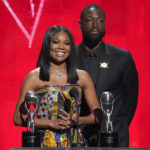 
              Gabrielle Union-Wade, left, and Dwayne Wade accept the president's award at the 54th NAACP Image Awards on Saturday, Feb. 25, 2023, at the Civic Auditorium in Pasadena, Calif. (AP Photo/Chris Pizzello)
            