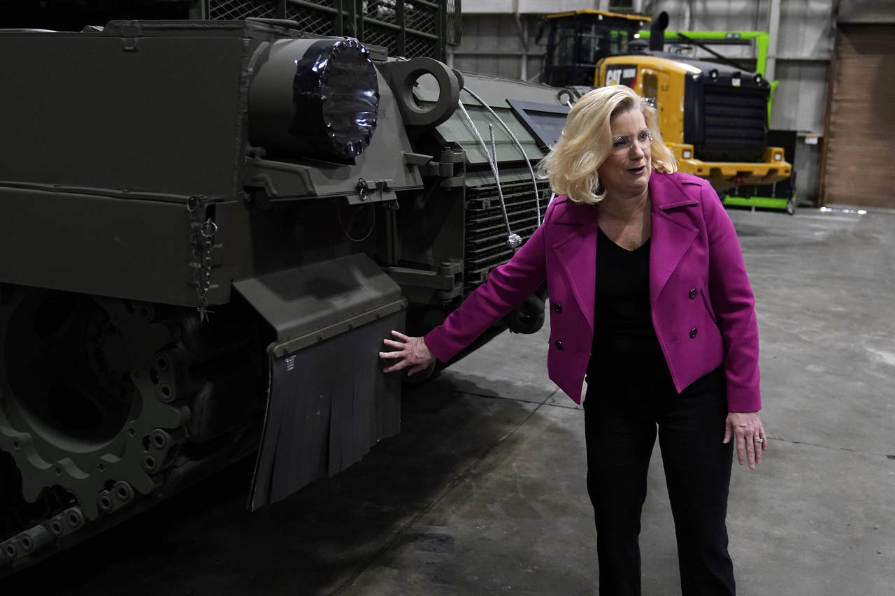 Secretary of the Army Christine Wormuth looks over the latest version of the M1A2 Abrams main battl...