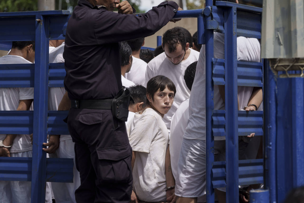 File - Men who were detained under a state of exception, are transported in a livestock trailer to ...