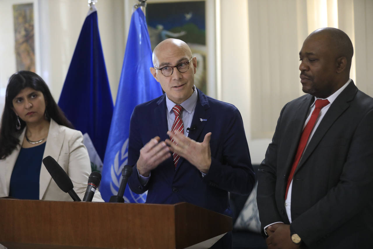United Nations High Commissioner for Human Rights Volker Türk, center, gives a press conference in...