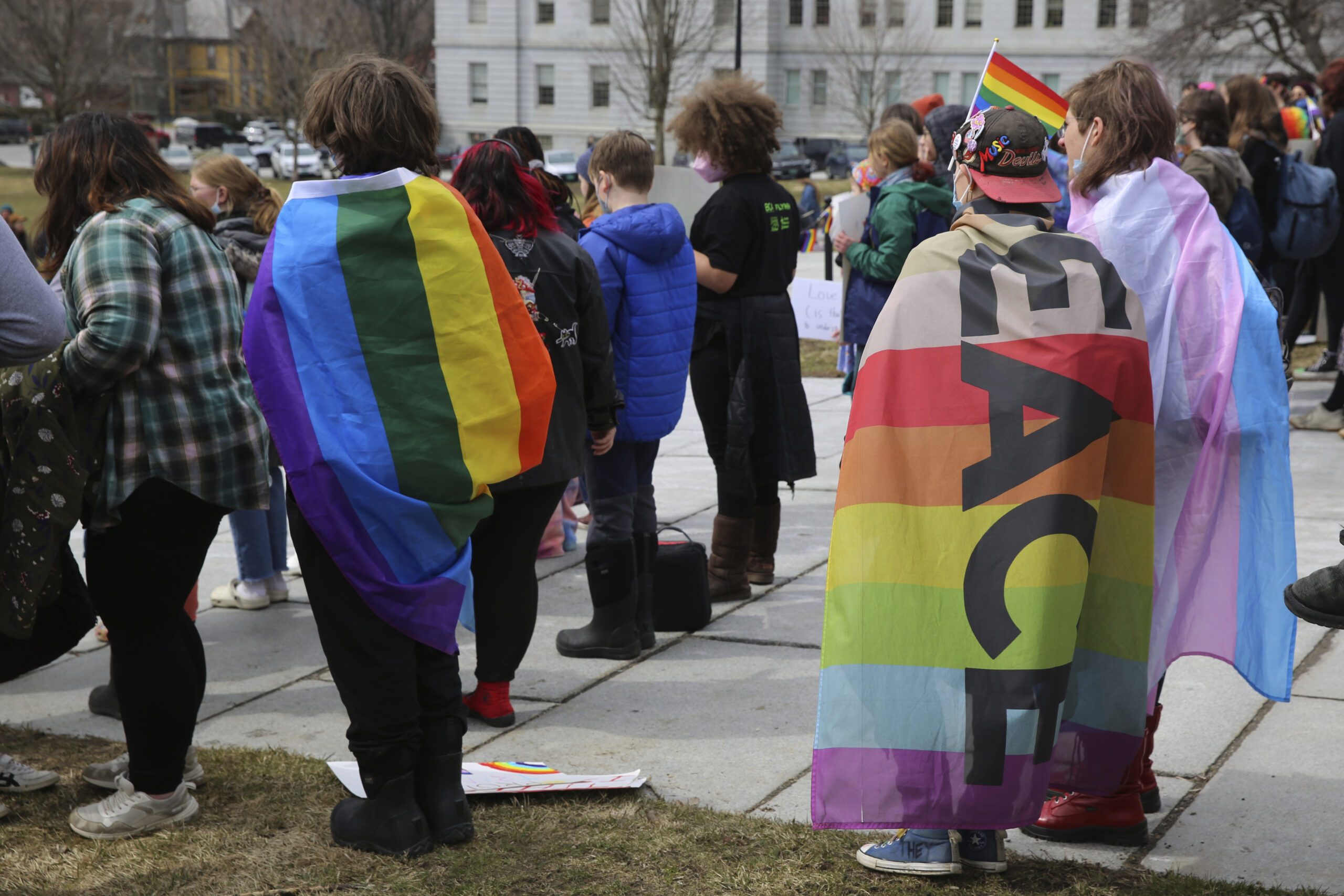 Hundreds of people gather on the lawn of the Vermont Statehouse in Montpelier, on Friday March 31, ...