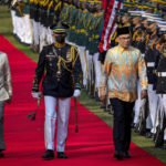 
              Malaysian Prime Minister Anwar Ibrahim, right, and Philippine President Ferdinand Marcos Jr., left, review honor guards during a welcome ceremony at Malacanang Palace in Manila, Philippines, Wednesday March 1, 2023. Anwar Ibrahim is in Manila to hold talks with President Marcos in an effort to boost bilateral ties between the two countries. (Ezra Acayan/Pool via AP)
            