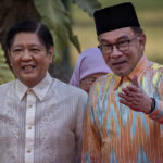 
              Malaysian Prime Minister Anwar Ibrahim, right, talks with Philippine President Ferdinand Marcos Jr. during a welcome ceremony at Malacanang Palace on Wednesday, March 1, 2023 in Manila, Philippines. (Ezra Acayan/Pool Photo via AP)
            