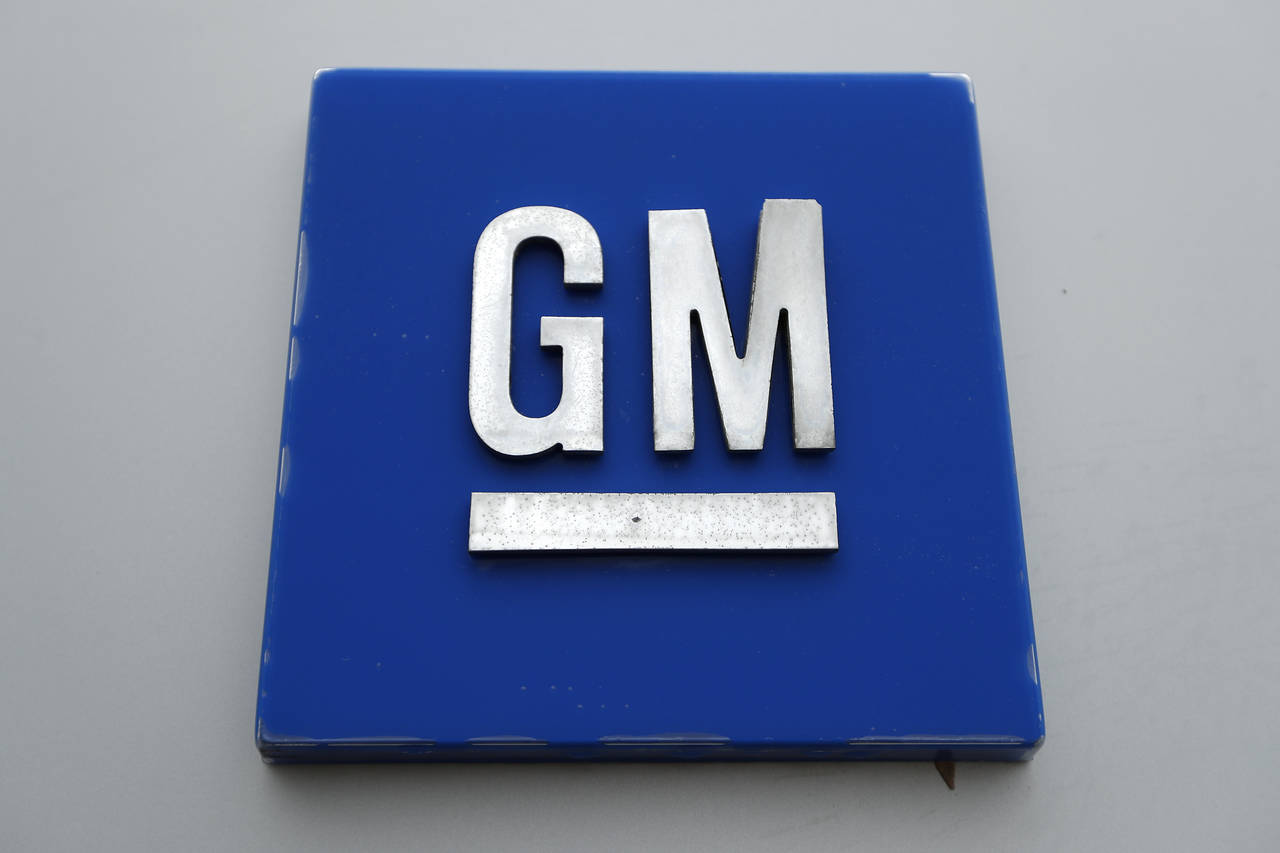 FILE - A General Motors logo is displayed outside the General Motors Detroit-Hamtramck Assembly pla...