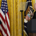 
              President Joe Biden talks about his nomination of Julie Sul left, to serve as the Secretary of Labor during an event in the East Room of the White House in Washington, Wednesday, March 1, 2023. (AP Photo/Susan Walsh)
            