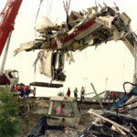 
              FILE - A crane lifts a coach of the derailed high-speed train from the track at the crash site in Eschede, on June 6, 1998. Rail travel in Europe is a common and relatively affordable and convenient way for many Europeans to travel. It also has a good safety record overall, growing safer in past years. Yet the tragedy in Greece on Wednesday is a reminder of how deadly crashes can be when they happen. (AP Photo/Jockel Finck, File)
            