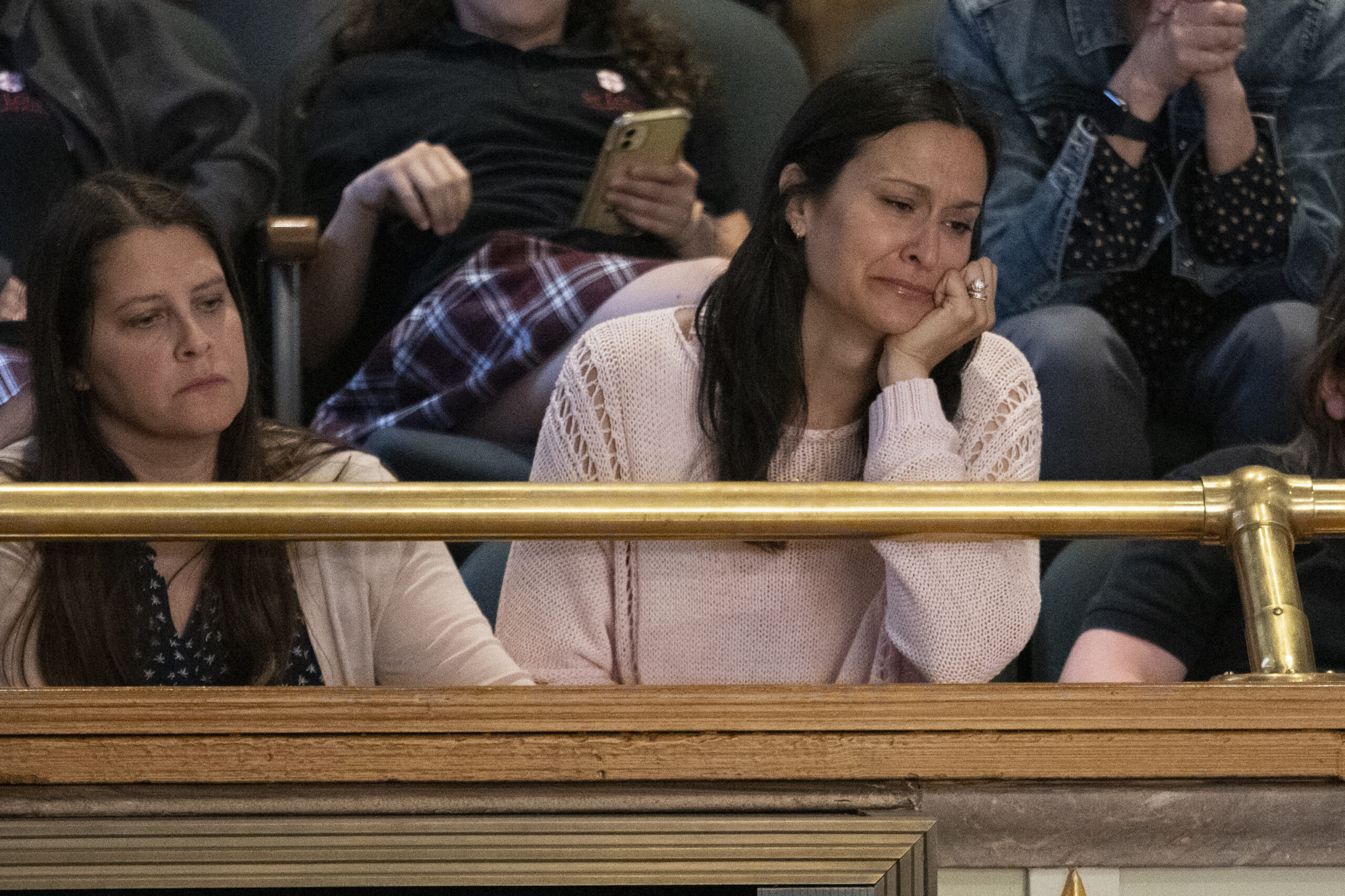 Katy Dieckhaus, mother of Covenant School shooting victim Evelyn Dieckhaus, right, attends a legisl...