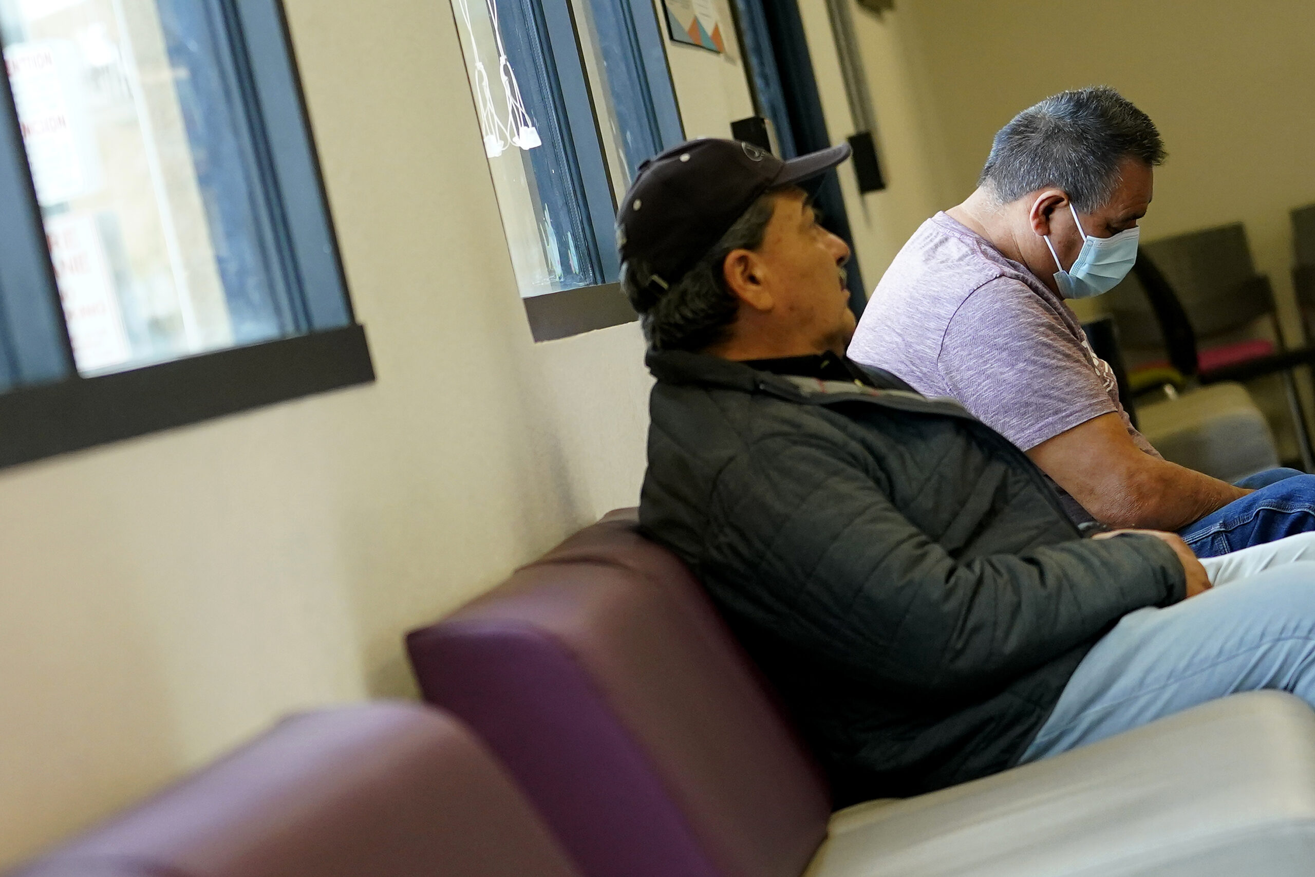 Patients waits to be seen at the Mountain Park Health Center, Thursday, March 30, 2023, in Phoenix....