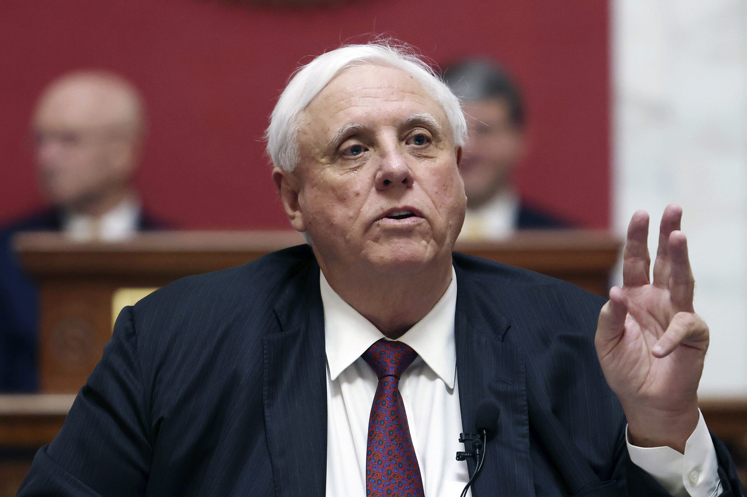 FILE - West Virginia Gov. Jim Justice delivers his annual State of the State address in the House C...