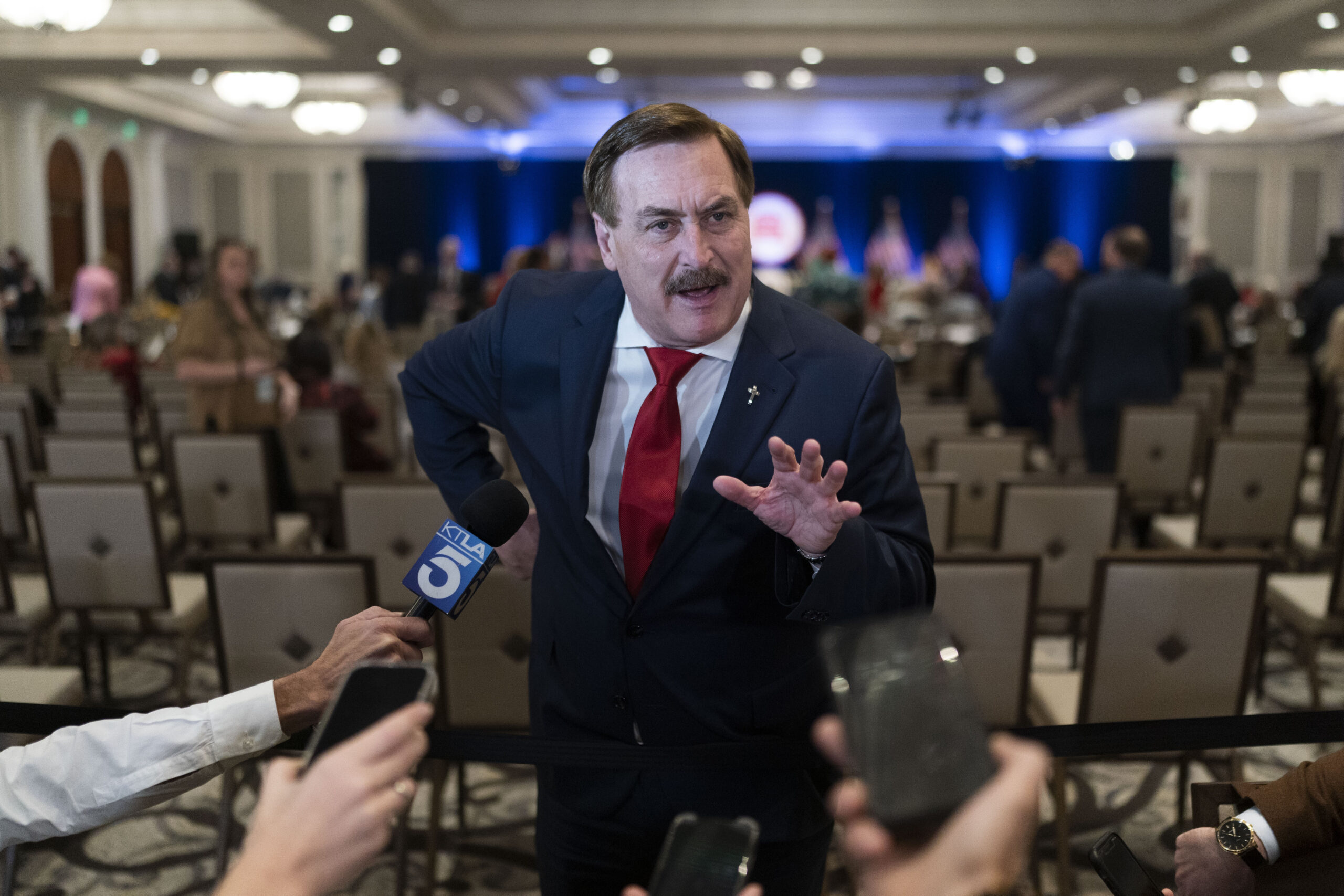 FILE - MyPillow chief executive Mike Lindell talks to reporters at the Republican National Committe...