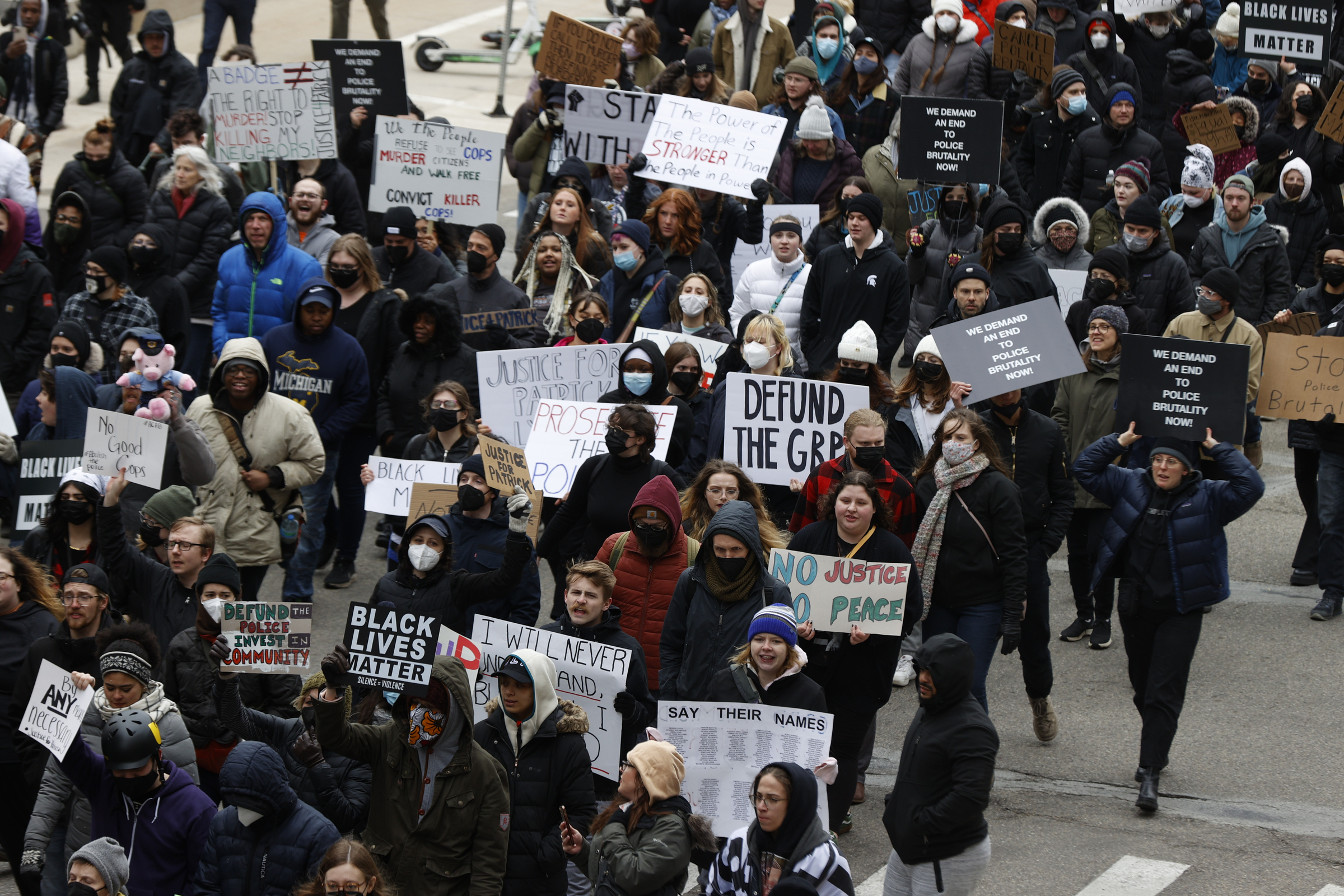 A crowd of over 300 people protest the killing of Patrick Lyoya in Grand Rapids, Mich., April 16, 2...