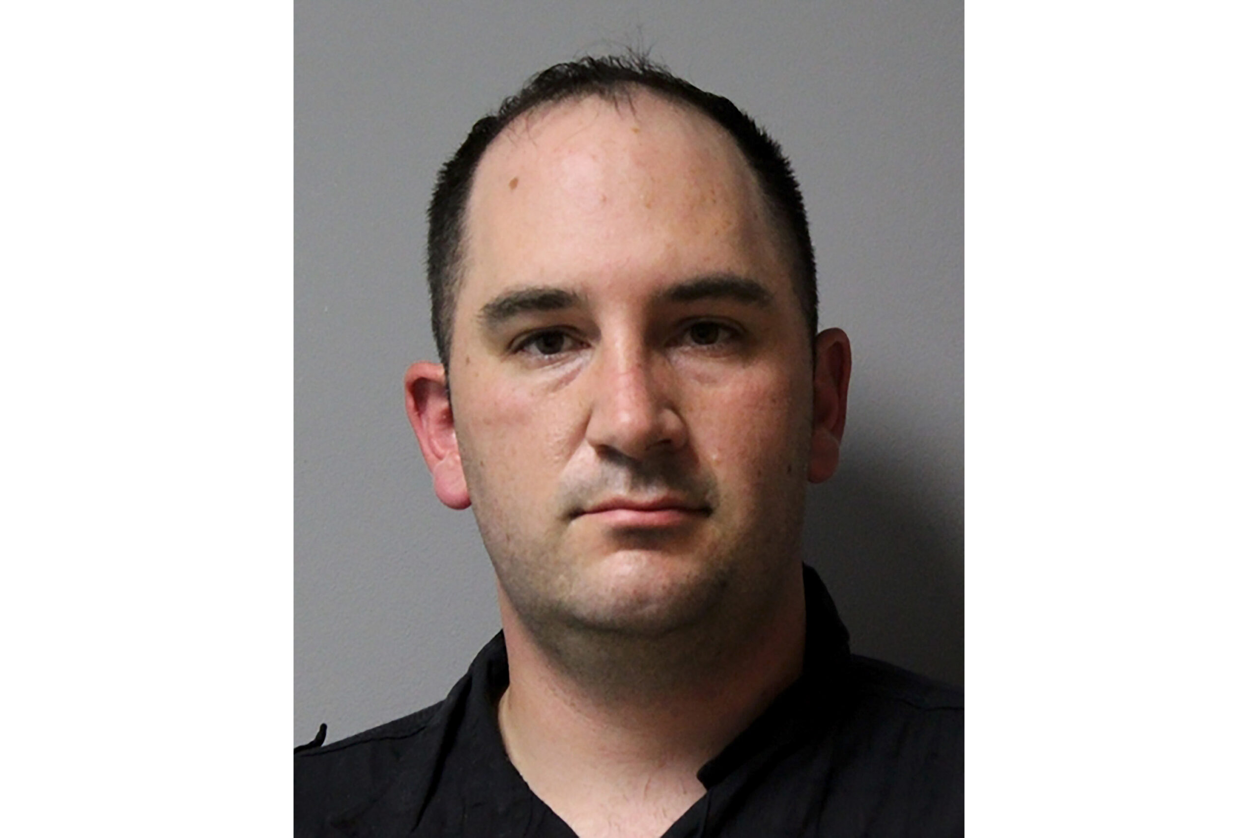 FILE - This booking photo provided by the Austin, Texas, Police Department shows U.S. Army Sgt. Dan...