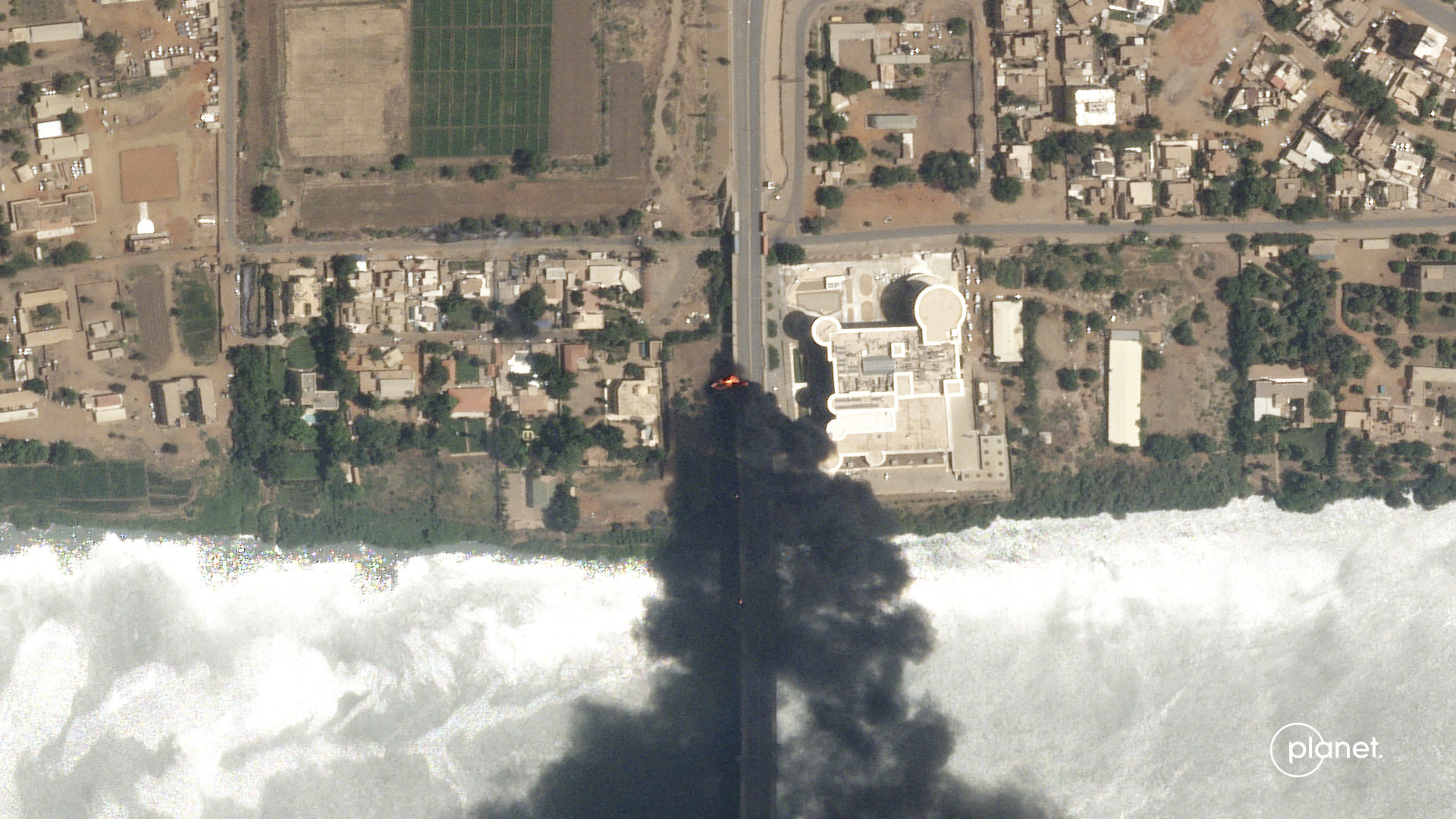 This satellite photo by Planet Labs PBC shows fires burning near a hospital in Khartoum, Sudan, Sun...