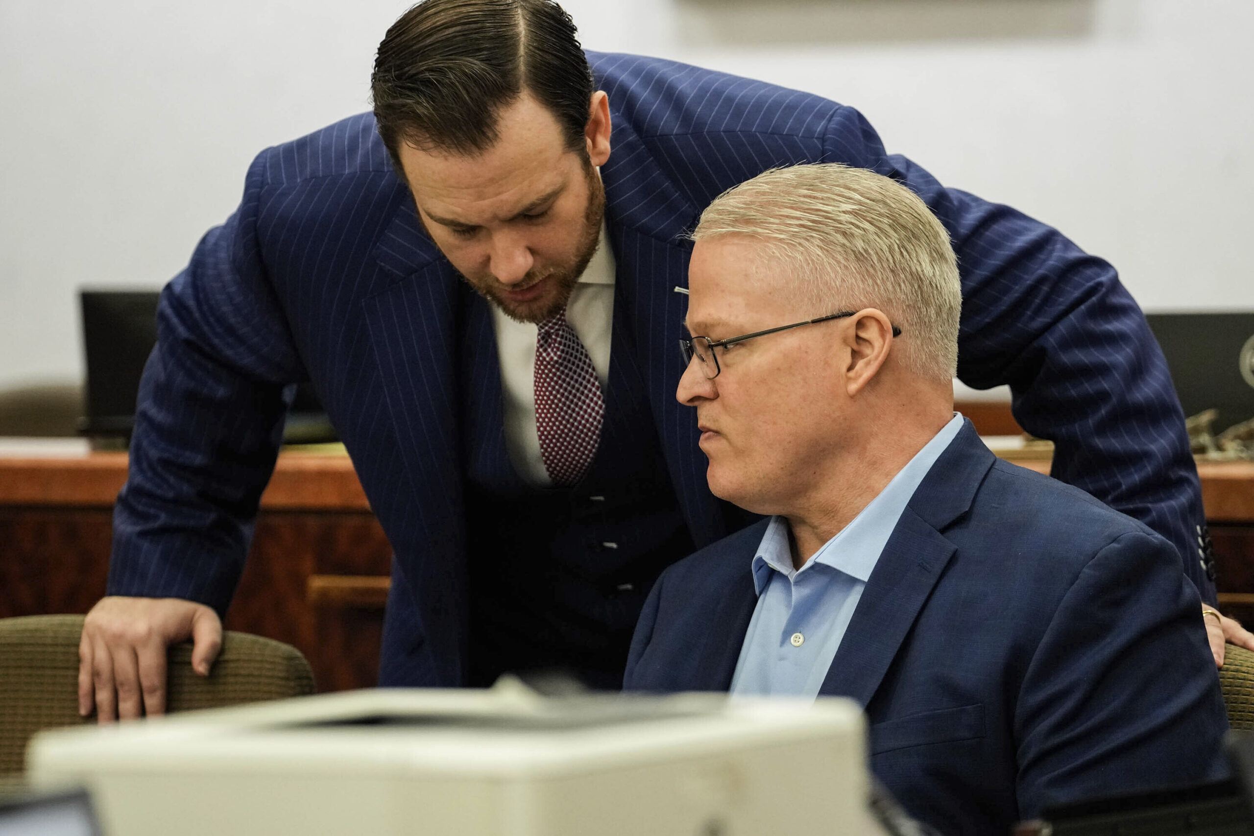 Defense attorney Romy Kaplan, left, speaks to client David Temple during his sentencing trial in th...
