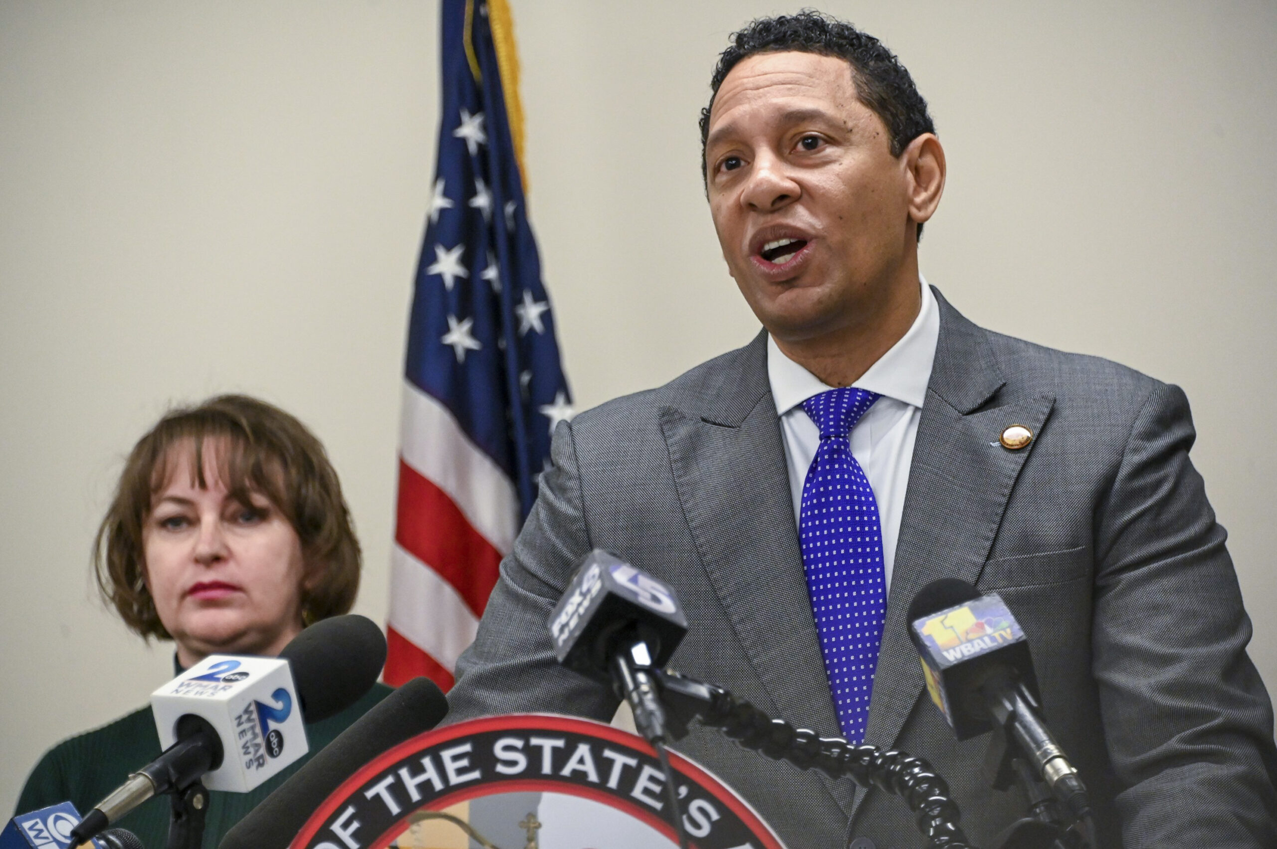 FILE - Baltimore State's Attorney Ivan J. Bates, right, speaks at a news conference, Jan. 20, 2023,...