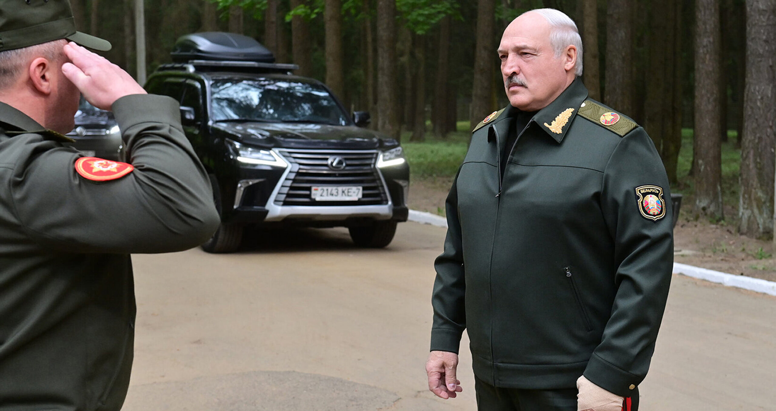 In this handout photo released by Belarus' Presidential Press Office, Belarusian President Alexande...