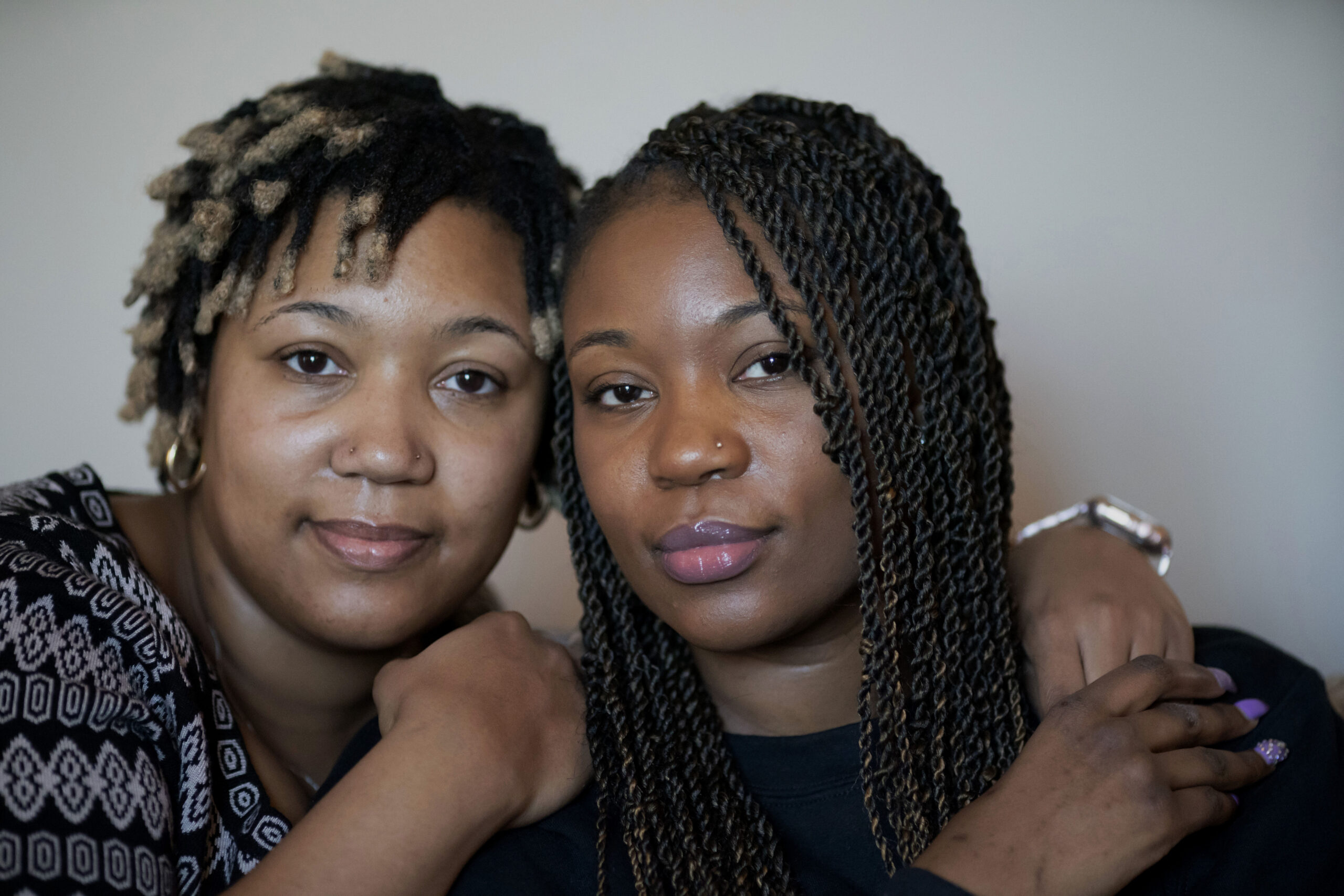 Sisters Angelica Lyons, left, and Ansonia Lyons pose for a portrait at their parents' home in Birmi...