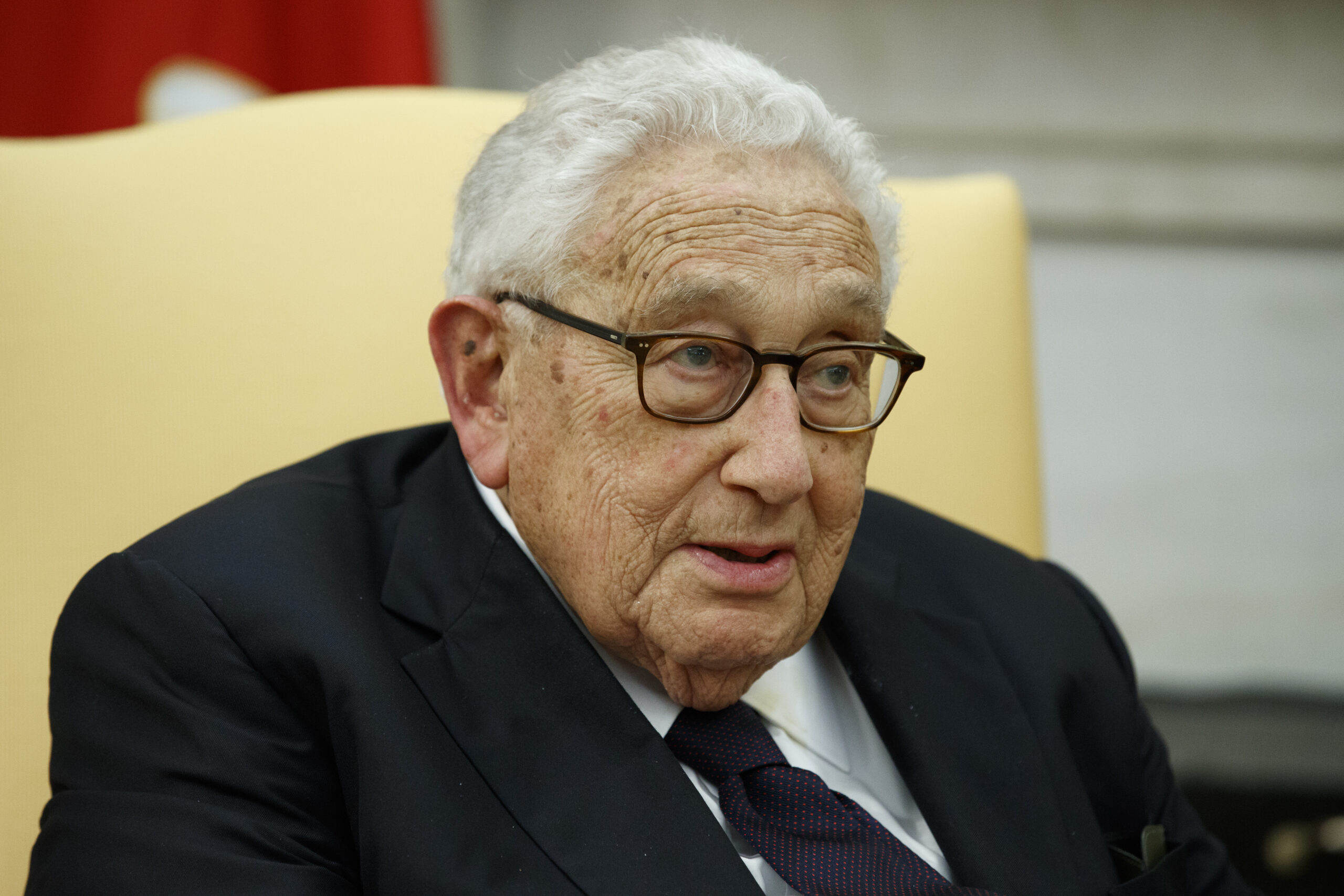 FILE - Former Secretary of State Henry Kissinger speaks during a meeting with President Donald Trum...