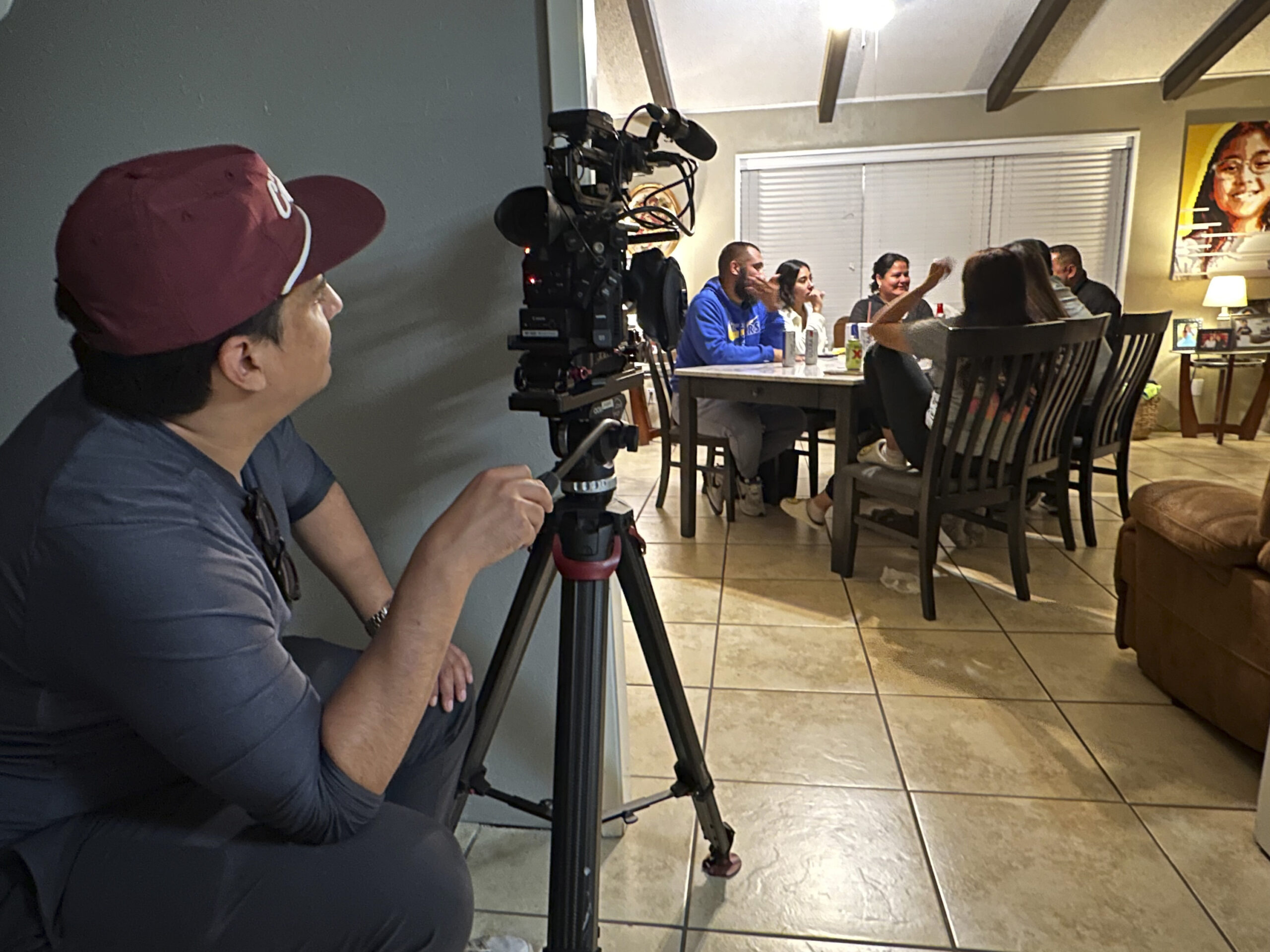 This image released by ABC News shows Nicco Quiñones filming inside the home of Jerry and Veronica...