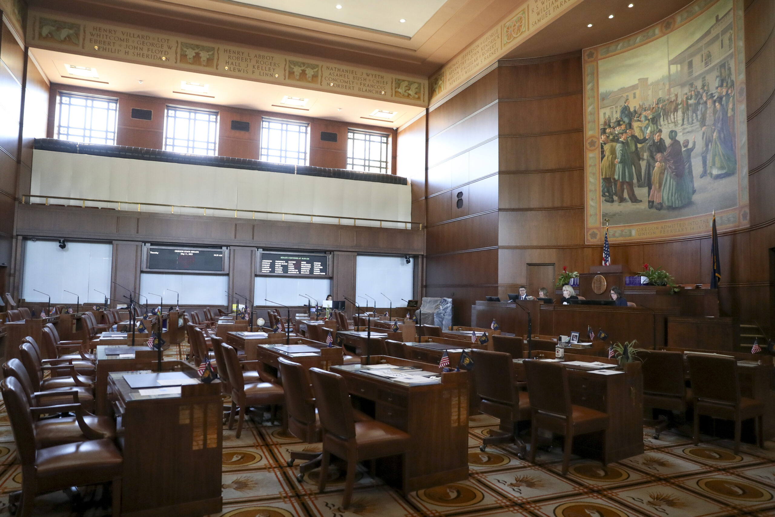 FILE - Empty chairs are shown in the Senate chambers prior to a legislative session at the Oregon S...