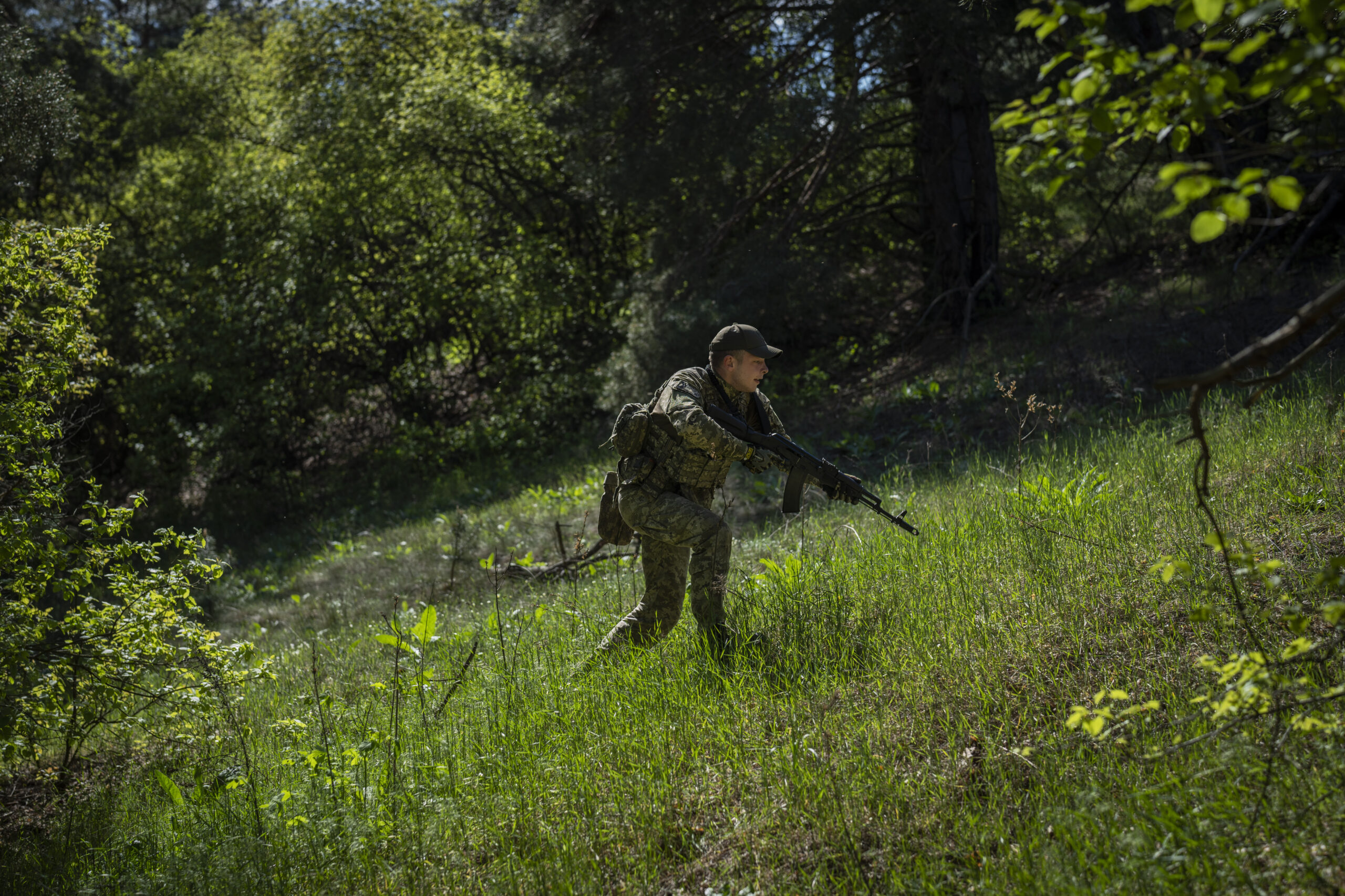 A Ukrainian Border Guard soldier participates in a military exercise in central Ukraine, Monday, Ma...