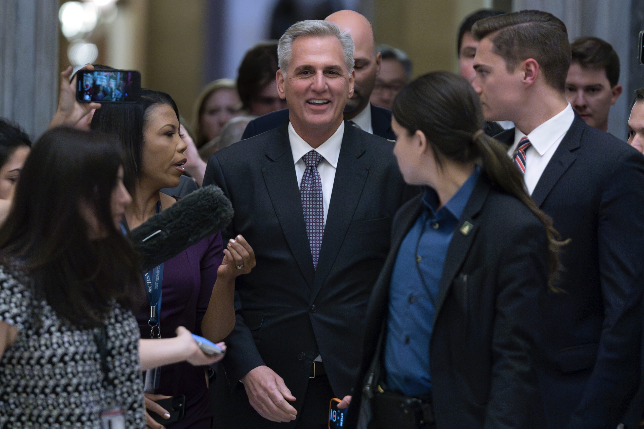 Speaker of the House Kevin McCarthy, R-Calif., walks to the House chamber at the Capitol in Washing...