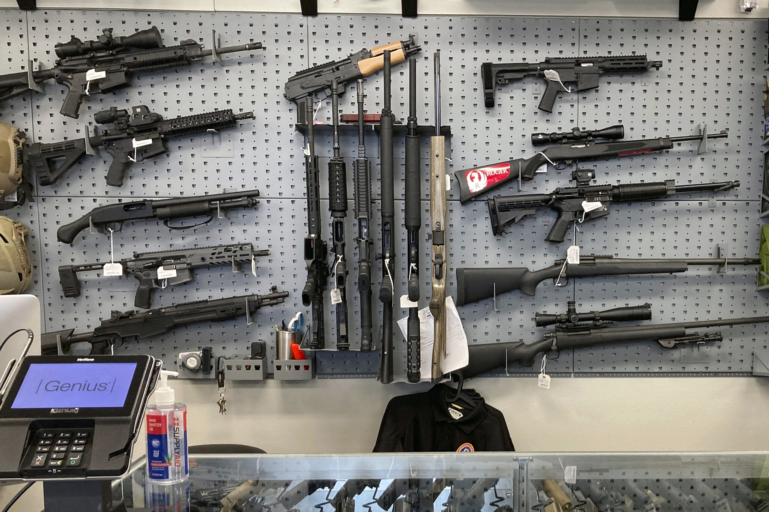 FILE - Firearms are displayed at a gun shop in Salem, Ore., Feb. 19, 2021. A federal judge in Portl...