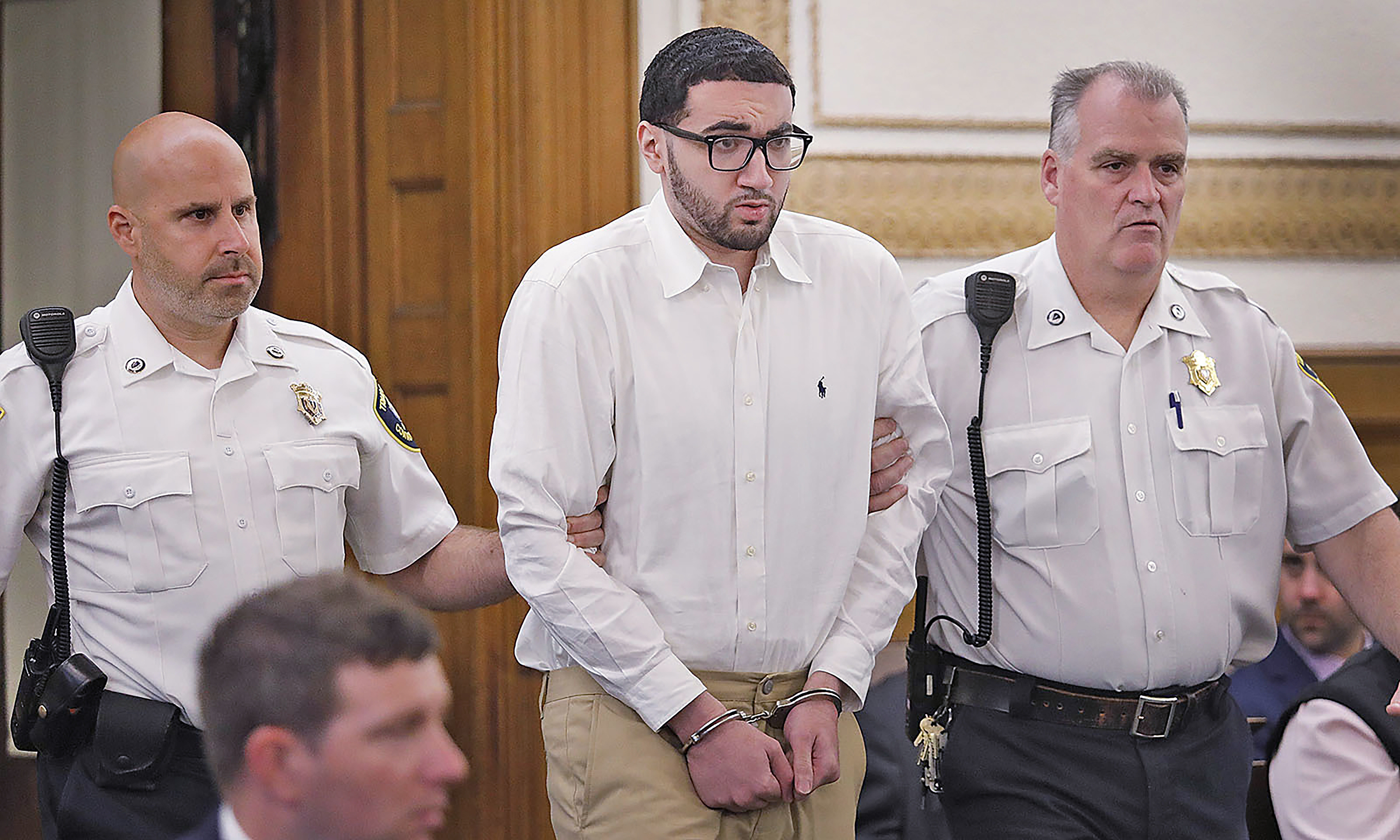 Emanuel "Manny " Lopes is escorted into court on day one of his trial for the 2018 murder of Weymou...