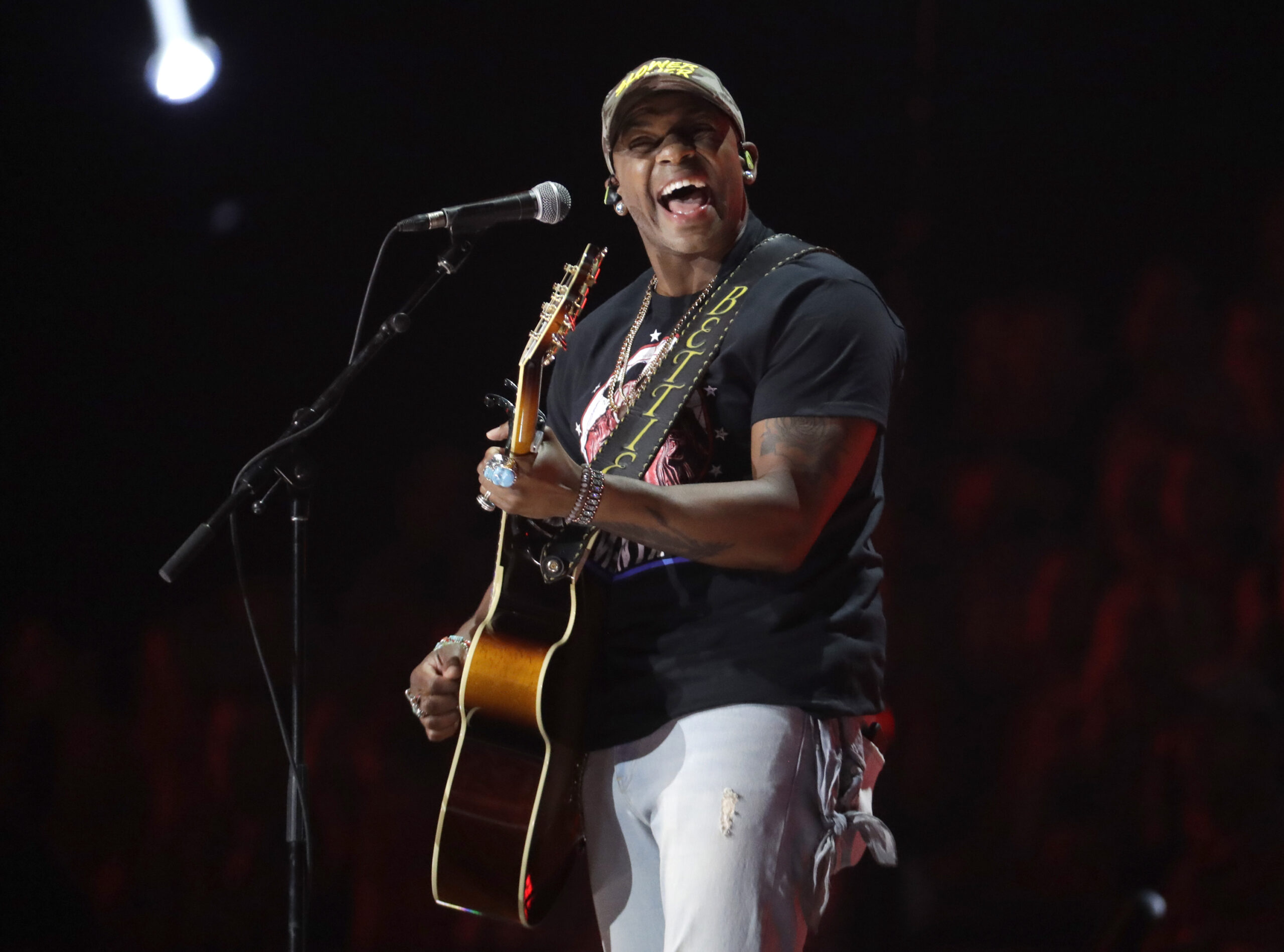 FILE - In this June 5, 2019 file photo, country singer Jimmie Allen performs "Best Shot" at the CMT...