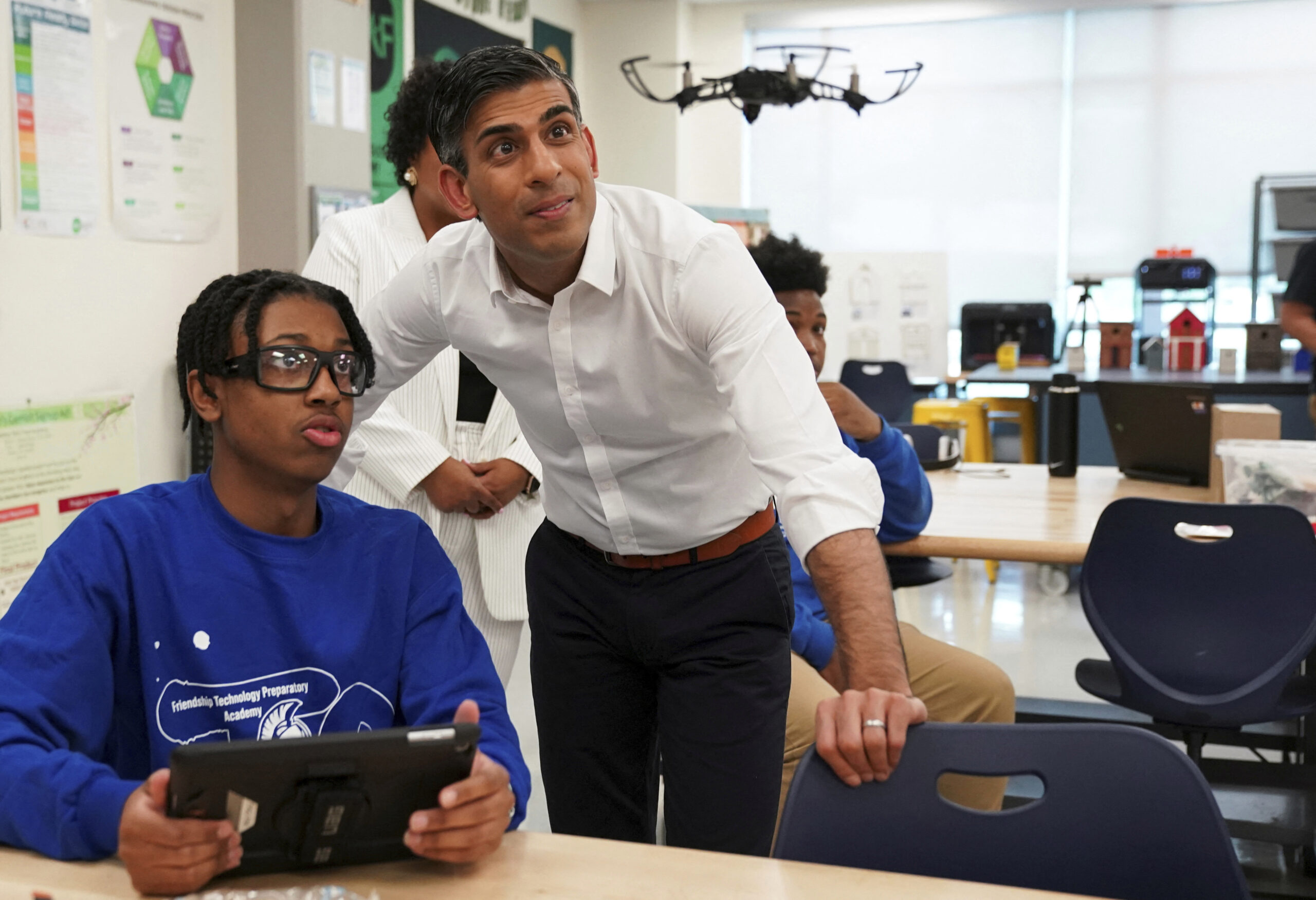British Prime Minister Rishi Sunak watches a drone demonstration as he visits the Friendship Techno...