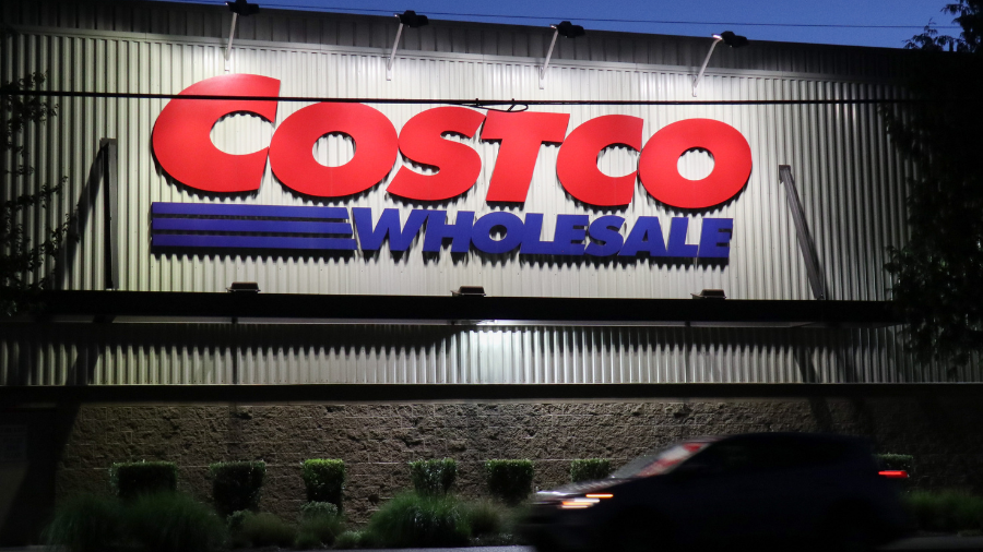 Image: A car passes by a Costco store in Seattle....