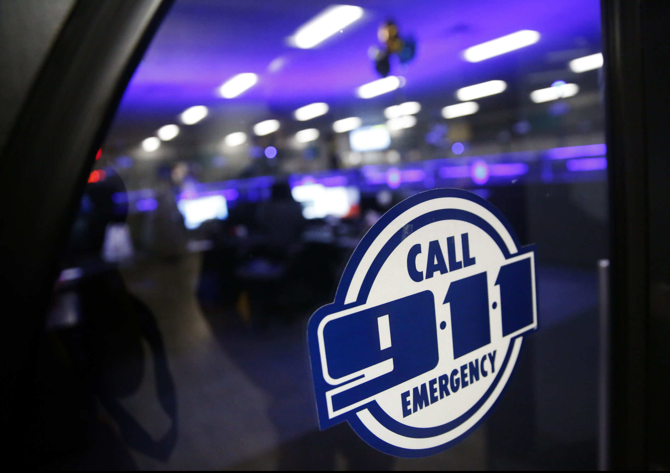 FILE - A police 911 call center is pictured on May 3, 2019, in Dallas. Emergency call center worker...