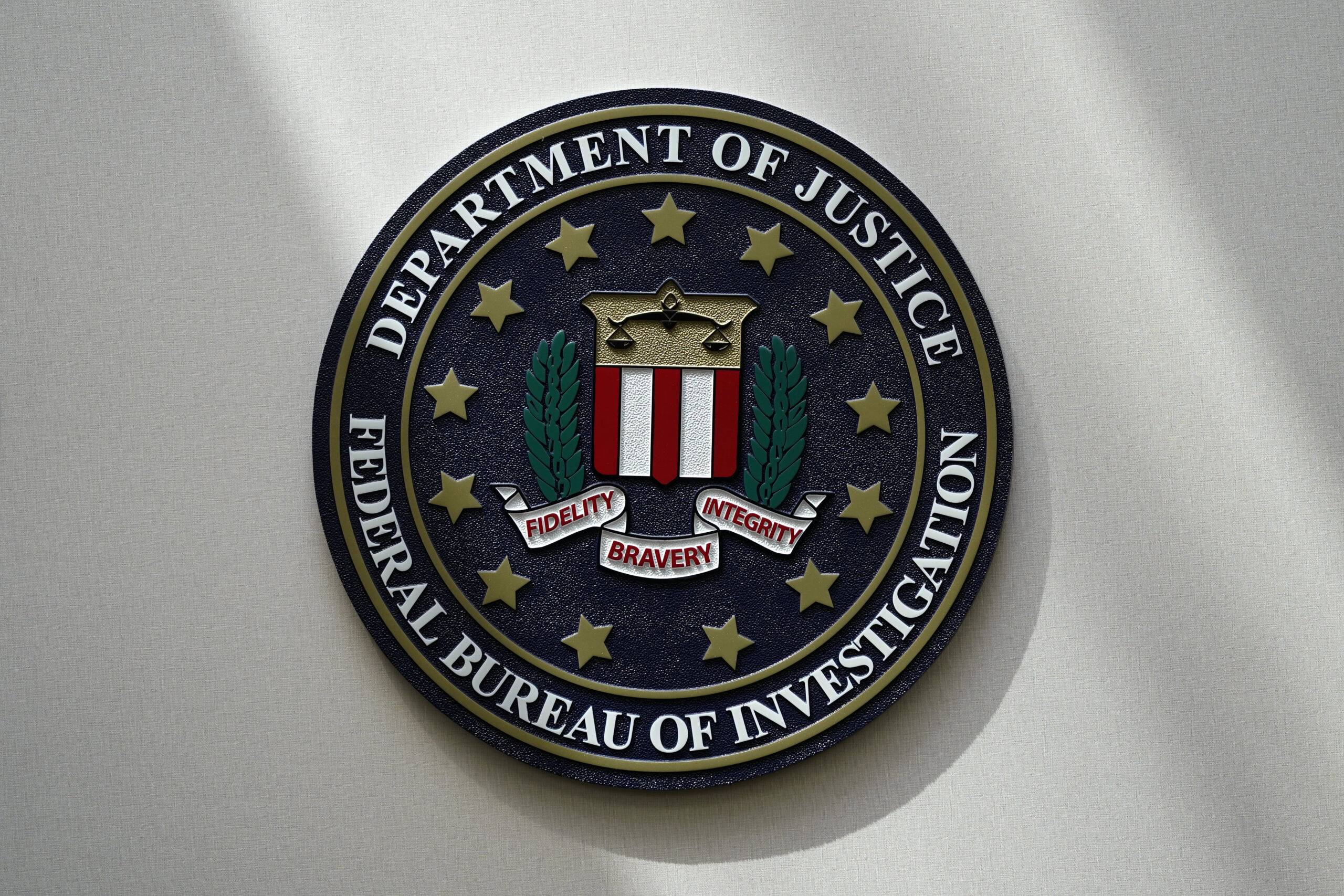 FILE - The FBI seal is pictured in Omaha, Neb., Aug. 10, 2022. A White House advisory board is call...