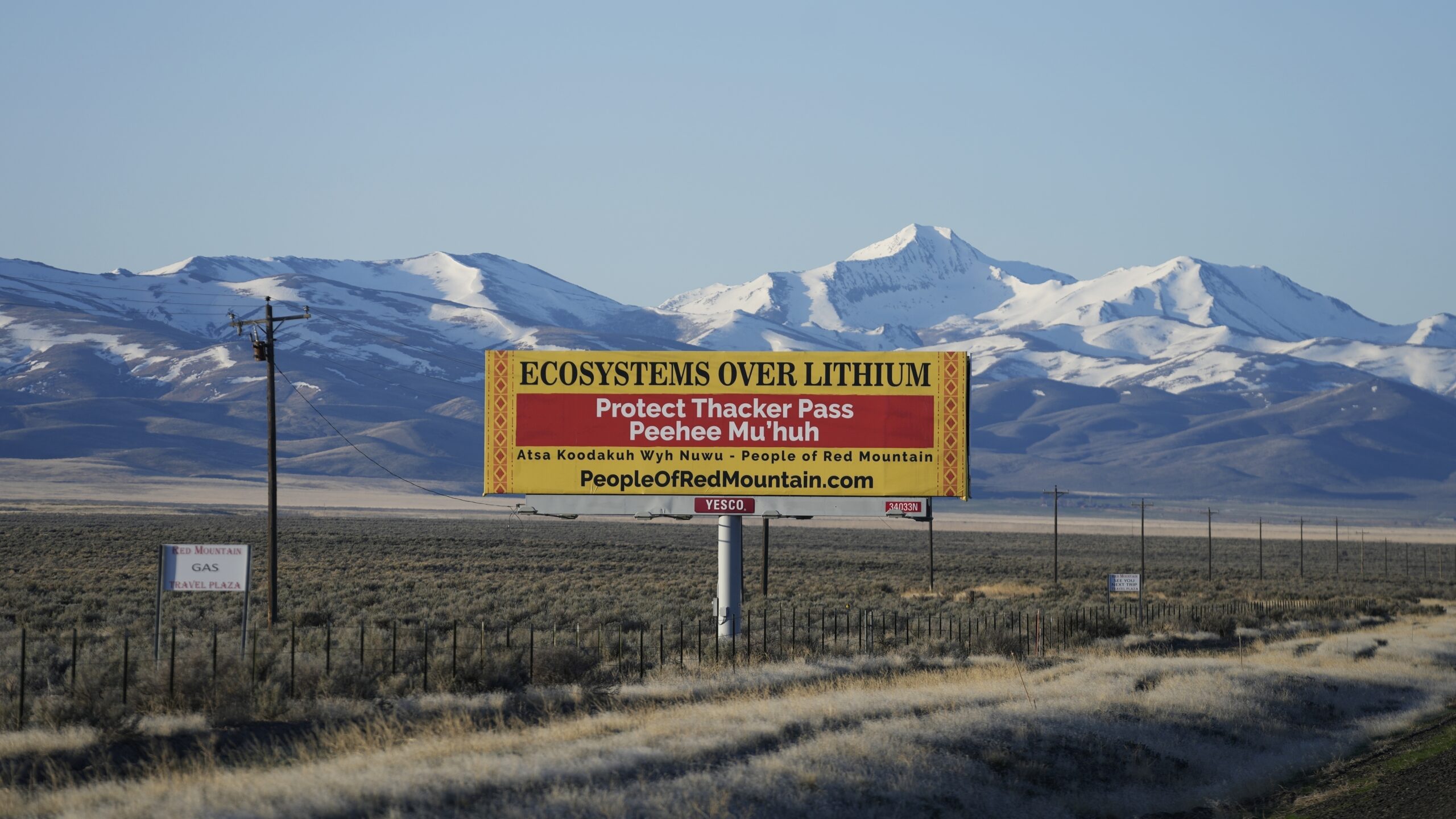 FILE - A billboard displays "Protect Thacker Pass" near the Fort McDermitt Paiute-Shoshone Indian R...