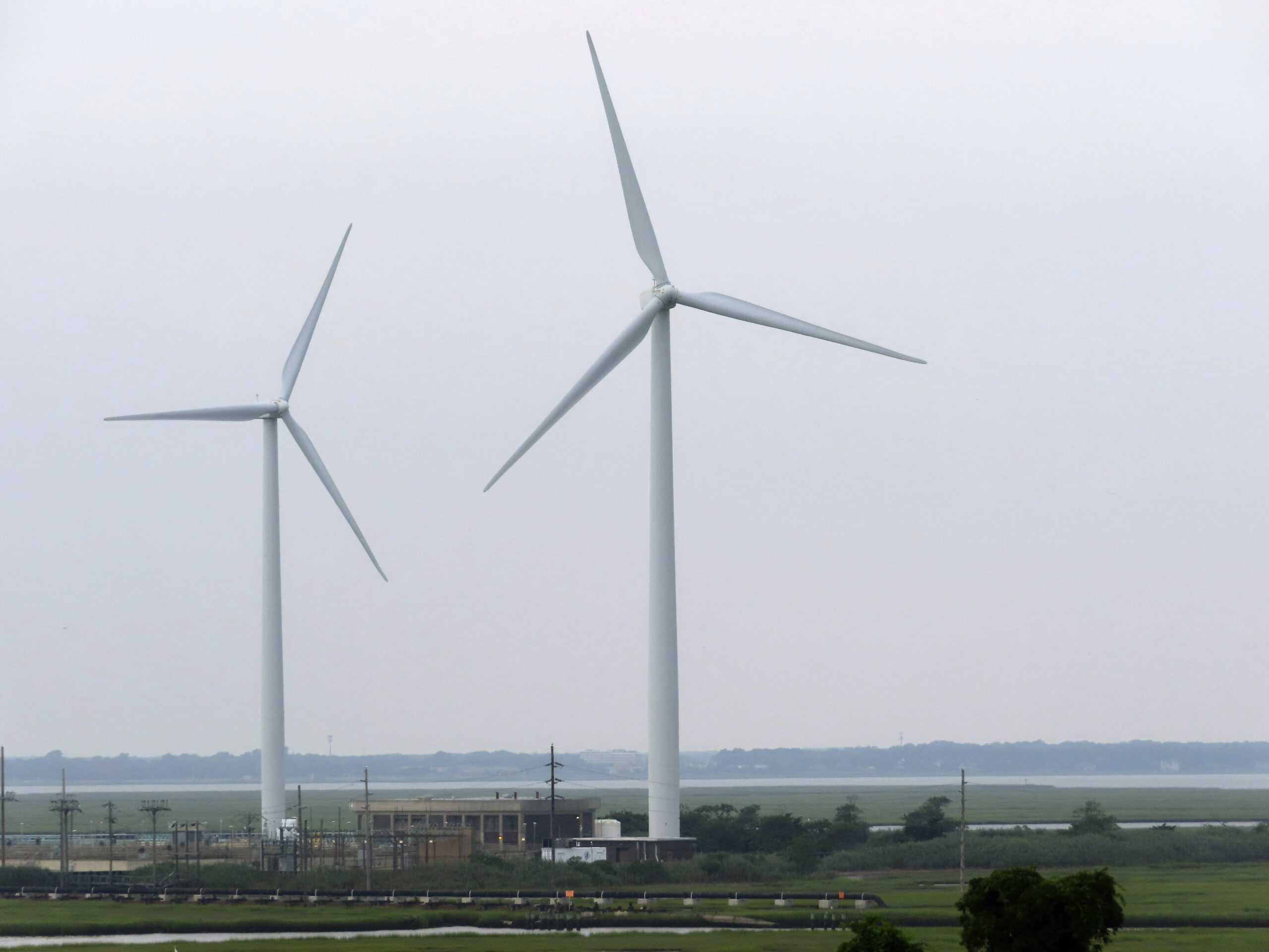 Land-based windmills in Atlantic City turn on Thursday, July 20, 2023. On Thursday, July 27, two gr...