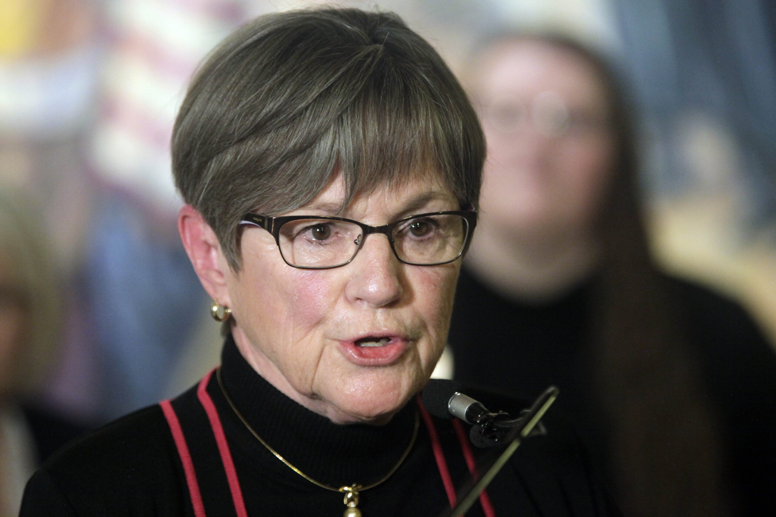 FILE - Kansas Gov. Laura Kelly speaks during a rally for teachers and education funding, April 25, ...