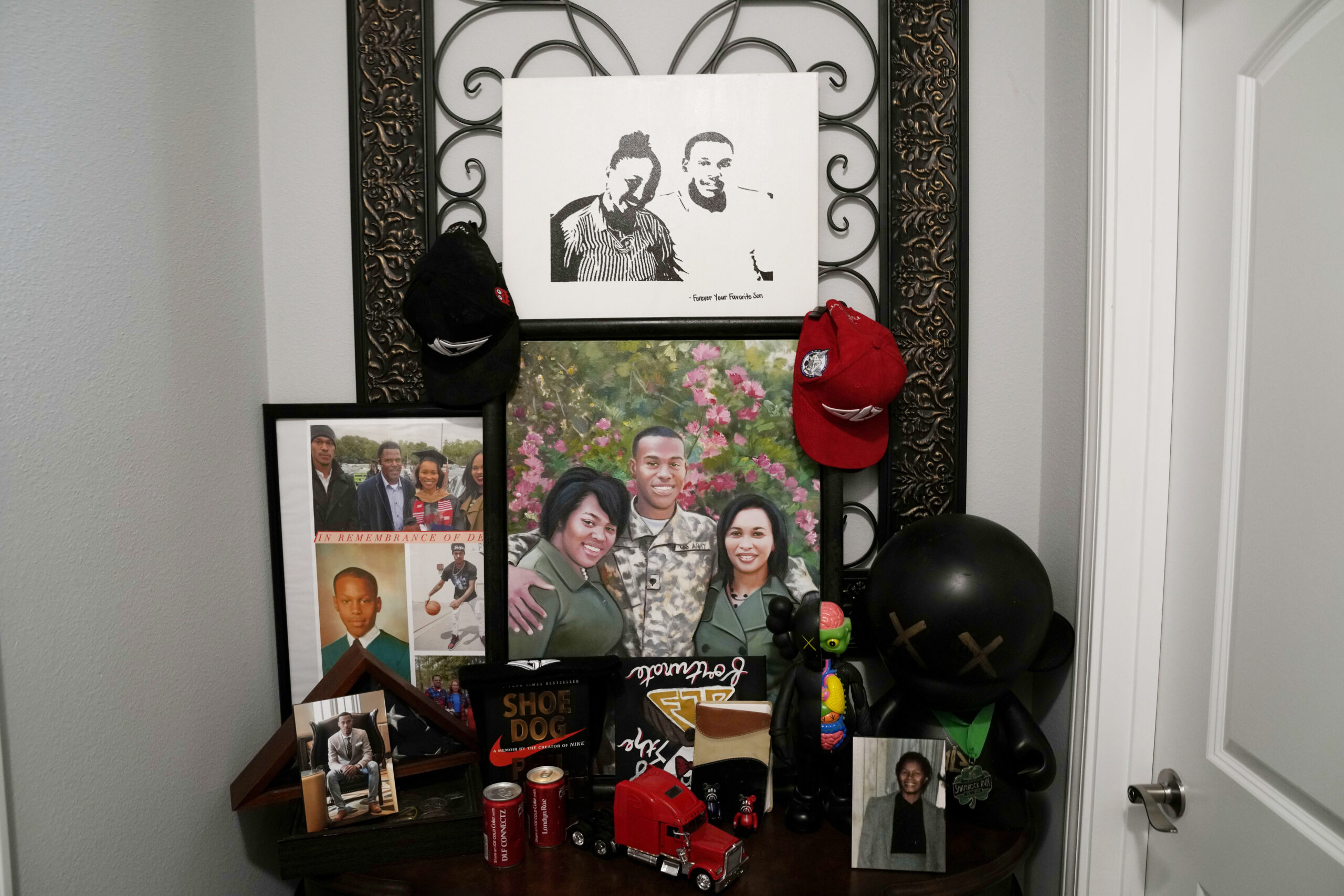 A hallway shrine to Dararius Evans, who was killed in January of 2020, is seen in the home of his m...