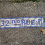 Another image shared by KIRO Newsradio listener Greg Schlosser, showing more samples of tiled street names along Madison Street in Seattle. (Courtesy Greg Schlosser)
