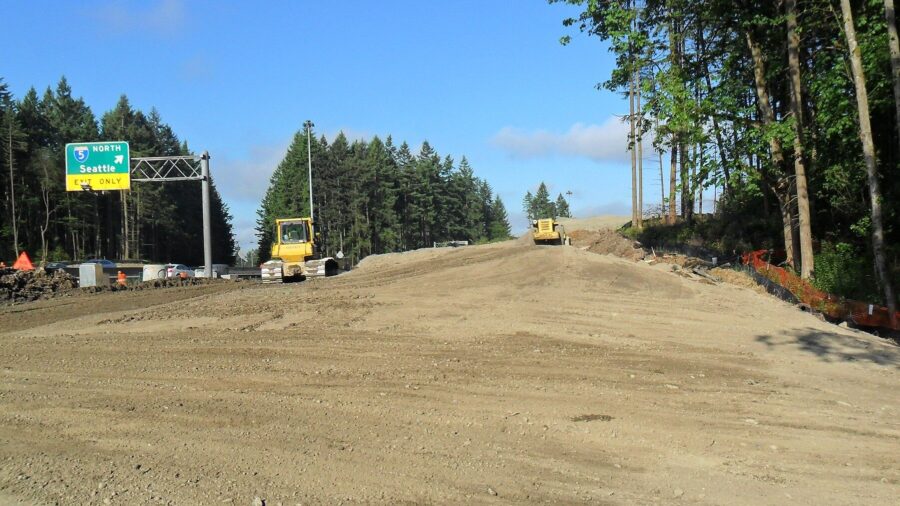 An old photo of crews are widening the north side of SR 18 to make room for the new flyover ramps b...